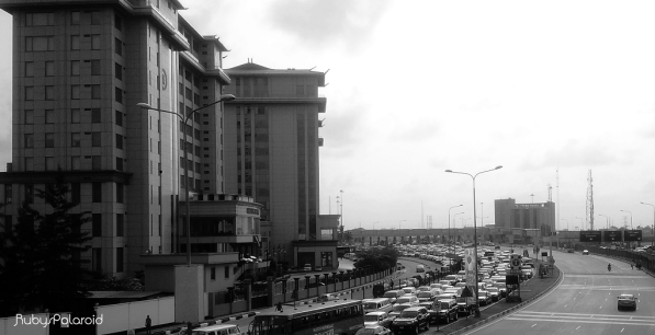 Morning Traffic beside Oriental Hotel Lagos by rubys polaroid